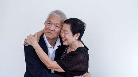 Happy smile Asian elderly couple in business attire, SME family ownerの写真素材