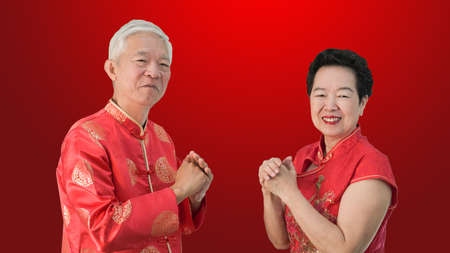 Asian senior Chinese new year gesture celebrationの写真素材