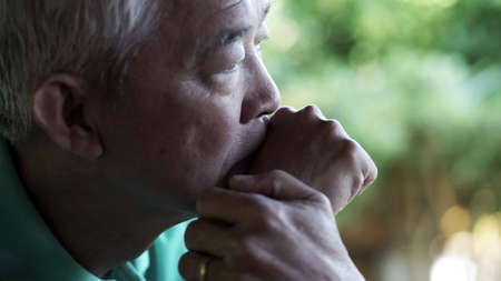 Asian senior man worry lost expression close upの写真素材