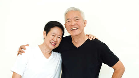 Asian senior couple happy together expression on white backgroundの写真素材
