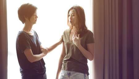 Asian mixed race woman friends listening to problemsの写真素材