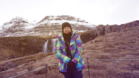 Asian senior woman fun travel after retirment to Europe Iceland tripの写真素材