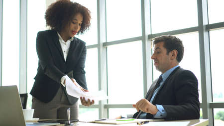 Fighting at work international colleauge argue on business mattersの写真素材