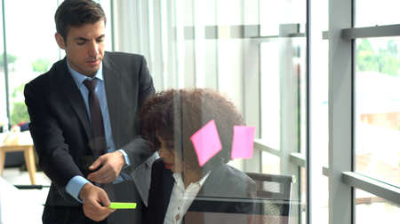 African and international professional colleague brainstrom marketing planの写真素材