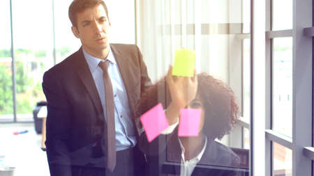 African and international professional colleague brainstrom marketing planの写真素材