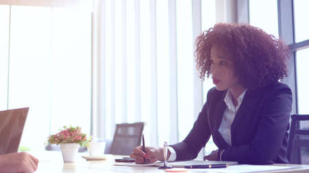 African young business woman working on strategy modern office