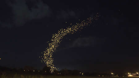 Loi krathong festival of Thailand laterns floating line from far away beatiful perspective view