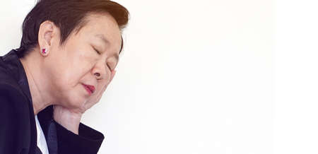 Stress facial expression Asian senior businesswoman dealing with problems
