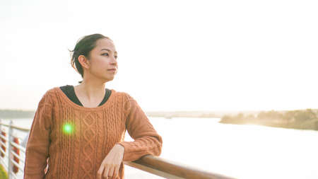 Asian woman tourist travel to Egypt crusing on NIle river on cruise shipの写真素材