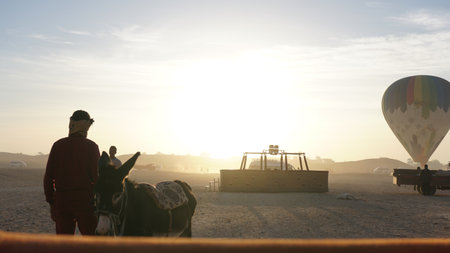 Luxor, Egypt December 2019: balloon riding at Valley of the king landing local pick upのeditorial素材