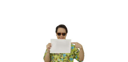 Asian senior woman retirement holiday sunglasses hawaii shirt holding blank copy space signの写真素材