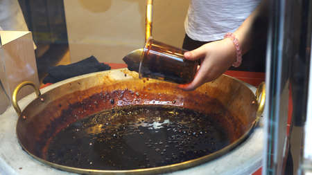 Making of burnt brown sugar boba tapioca milk tea shop in Hong Kongの写真素材