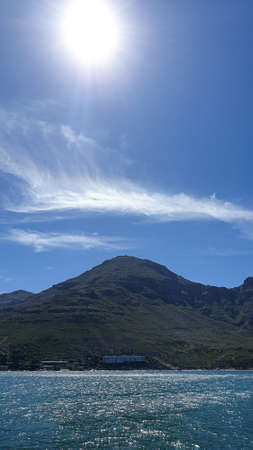 Hout bay landscape panorama view on boat going out o seal island Cape Town, South Africa tourist attractionの写真素材
