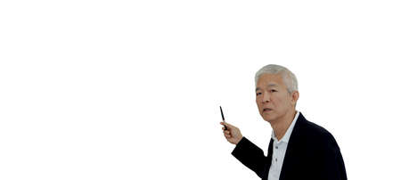 Serious Asian senior businessman executive manager teaching pointing over copy spaceの写真素材
