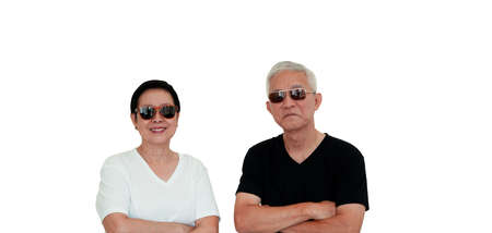 Asian senior elderly couple happy smile expression with sunglasses isolated copy spaceの写真素材