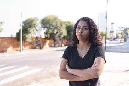 Black woman on urban background in casual clothingの写真素材