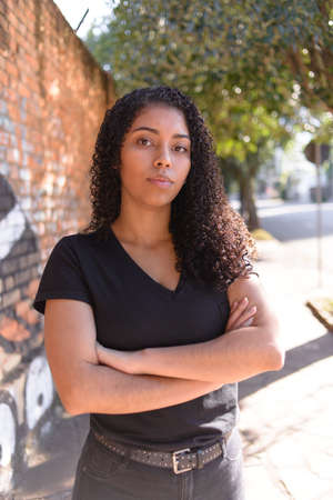 Black woman on urban background in casual clothingの写真素材