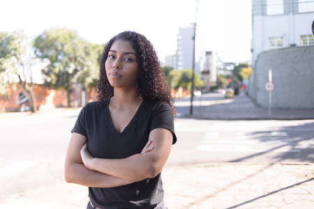 Black woman on urban background in casual clothingの写真素材