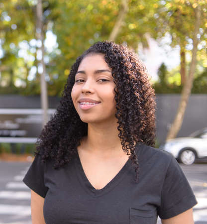 Black woman on urban background in casual clothingの写真素材