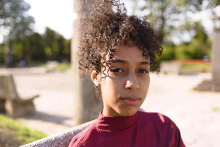 Young beautiful african american woman outside in urban backgroundの写真素材