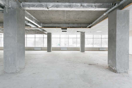 empty pure commercial office building undecorated in gray colors.open space office