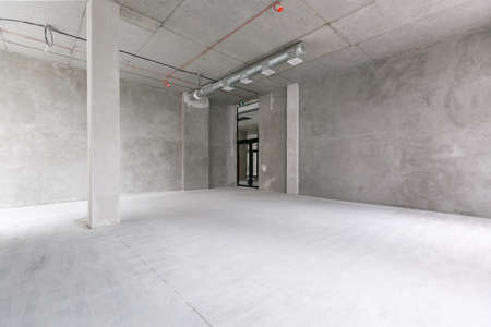 empty pure commercial office building undecorated in gray colors.open space office