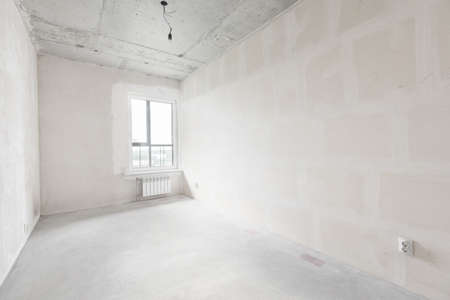 interior of the apartment without decoration in gray colorsの写真素材