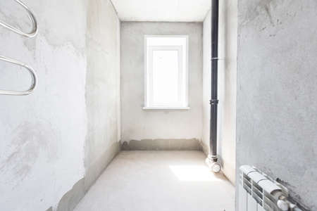 interior of the apartment without decoration in gray colorsの写真素材