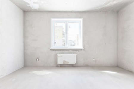 interior of the apartment without decoration in gray colors