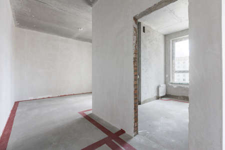 interior of the apartment without decoration in gray colorsの写真素材