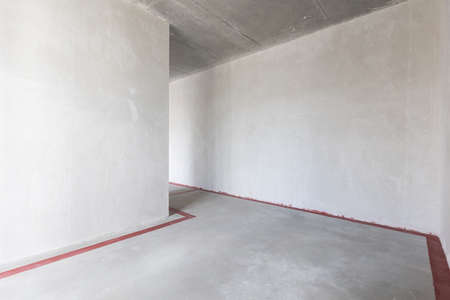 interior of the apartment without decoration in gray colorsの写真素材