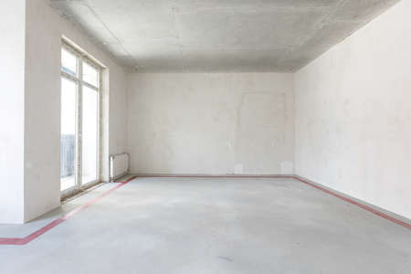 interior of the apartment without decoration in gray colorsの写真素材