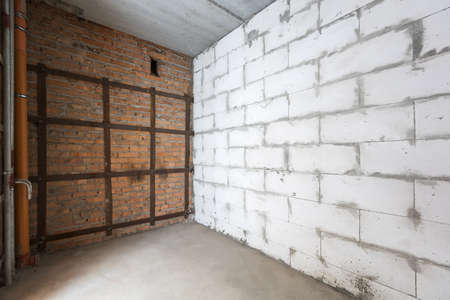 interior of the apartment without decoration in gray colors