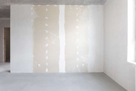 interior of the apartment without decoration in gray colorsの写真素材