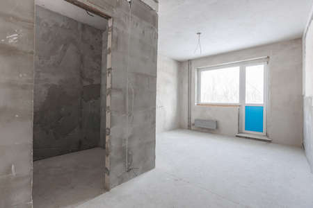interior of the apartment without decoration in gray colorsの写真素材