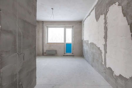 interior of the apartment without decoration in gray colorsの写真素材