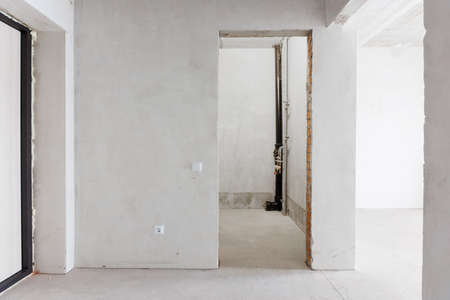 interior of the apartment without decoration in gray colorsの写真素材