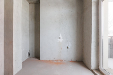 interior of the apartment without decoration in gray colorsの写真素材