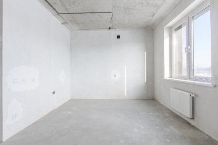 interior of the apartment without decoration in gray colorsの写真素材