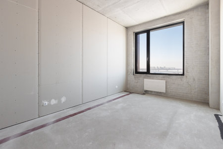 interior of the apartment without decoration in gray colorsの写真素材