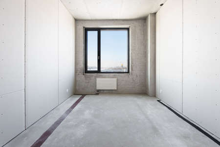 interior of the apartment without decoration in gray colors