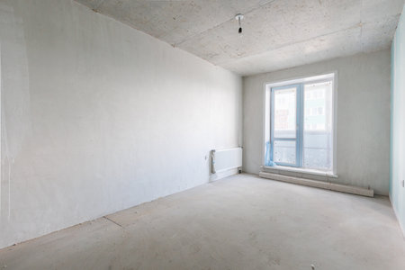 interior of the apartment without decoration in gray colorsの写真素材