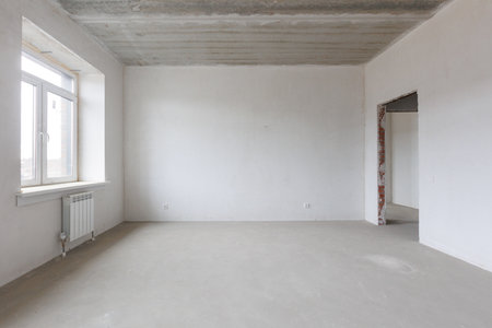 interior of the apartment without decoration in gray colorsの写真素材