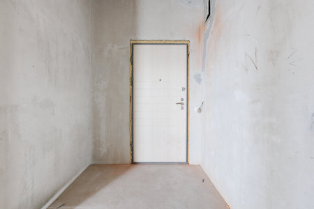 interior of the apartment without decoration in gray colorsの写真素材