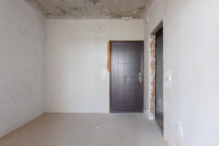 interior of the apartment without decoration in gray colorsの写真素材