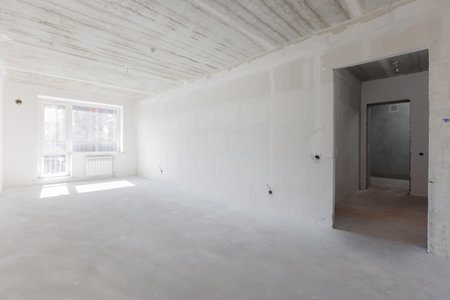 interior of the apartment without decoration in gray colorsの写真素材