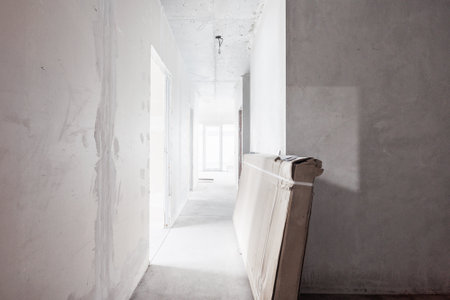 interior of the apartment without decoration in gray colors. rough finishの写真素材