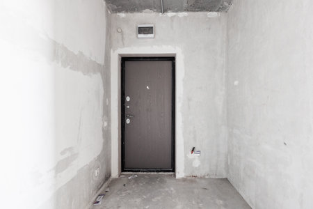 interior of the apartment without decoration in gray colors. rough finishの写真素材