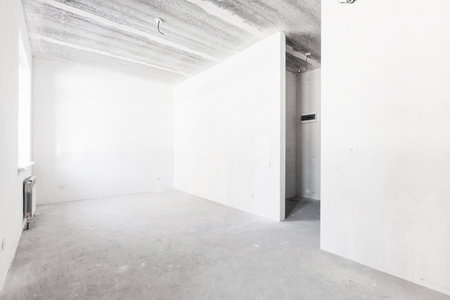 interior of the apartment without decoration in gray colors. rough finish