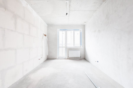 interior of the apartment without decoration in gray colors. rough finishの写真素材